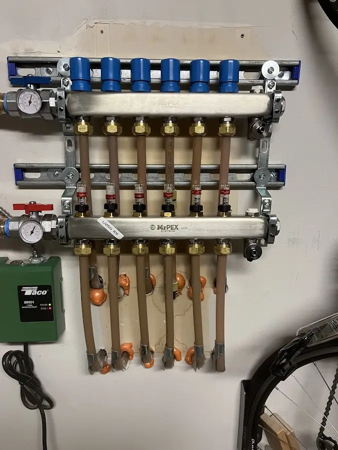 Plumber performing Gas Leak Detection at a residential property in Ledyard